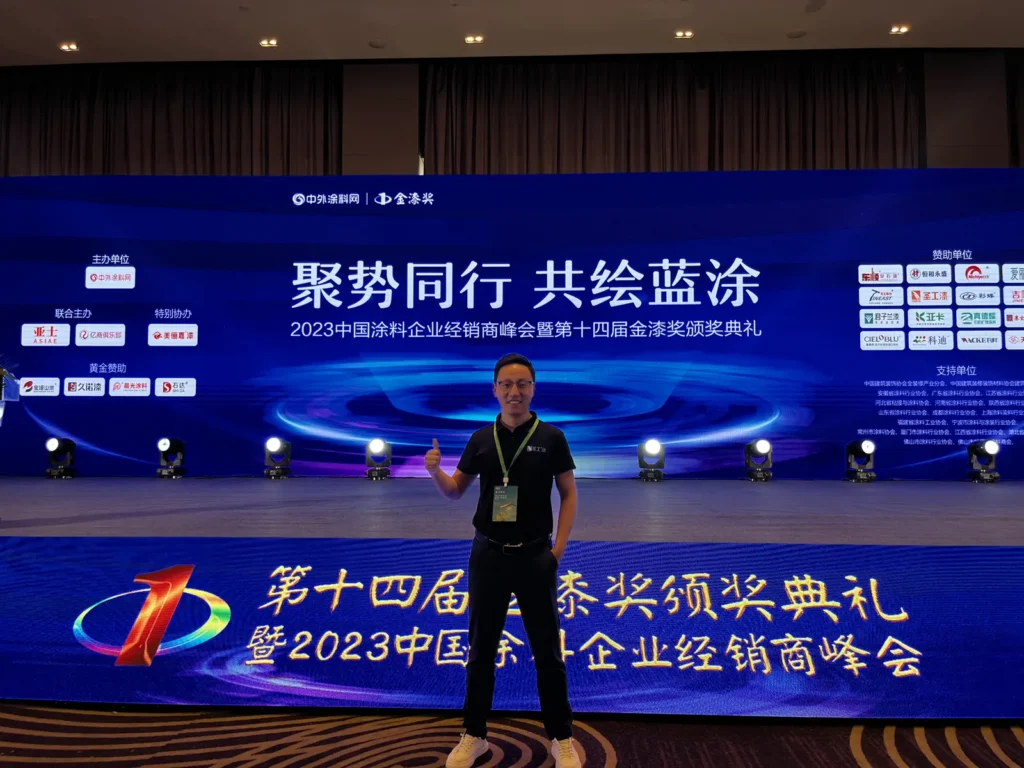 Industry summit and award ceremony stage with SINGAL PAINT branding